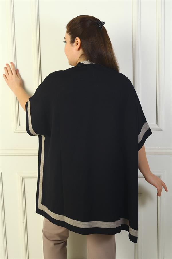 Poncho grande taille pour femme avec bouton latéral, poches rayées et imprimé léopard.