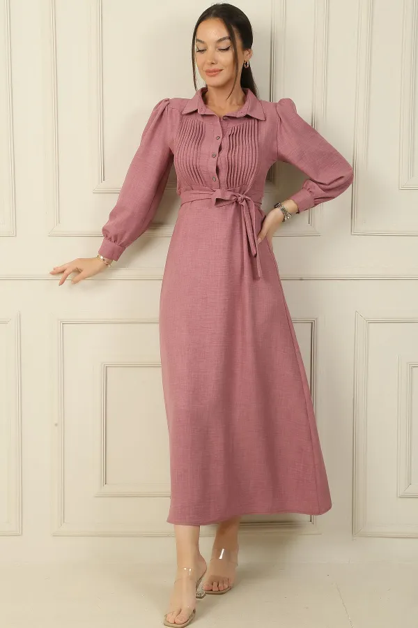 Long dress with half-button front, ribbed detail, and belted waist.