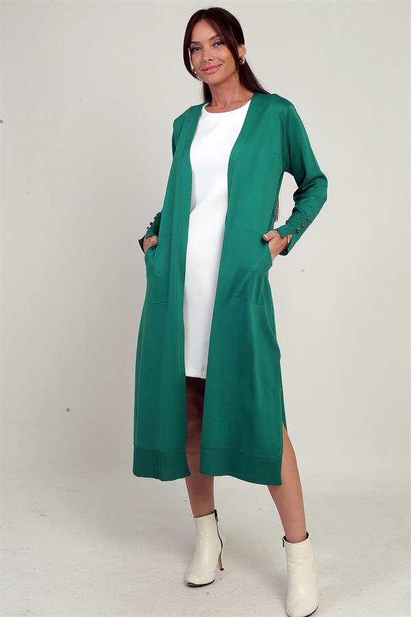 Gilet long pour femme avec manches boutonnées, poches et fentes latérales