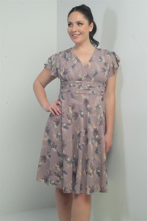 Wrap-neck, ruffled sleeve, lined plus-size printed linen dress.