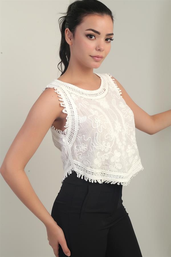 Chemisier festonné brodé à paillettes et perles pour femme