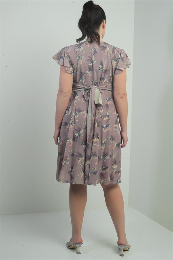 Wrap-neck, ruffled sleeve, lined plus-size printed linen dress.