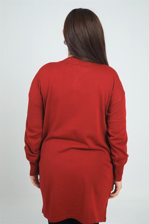 Tunique en maille grande taille pour femme, avec une poche avant et un imprimé pierre.