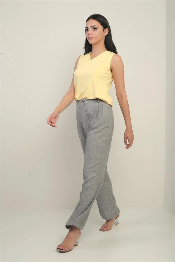 Pantalon palazzo pour femme avec taille élastiquée, poches et détails plissés