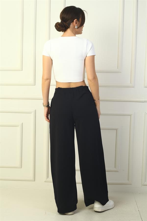 Pantalon palazzo à poches plissées pour femme