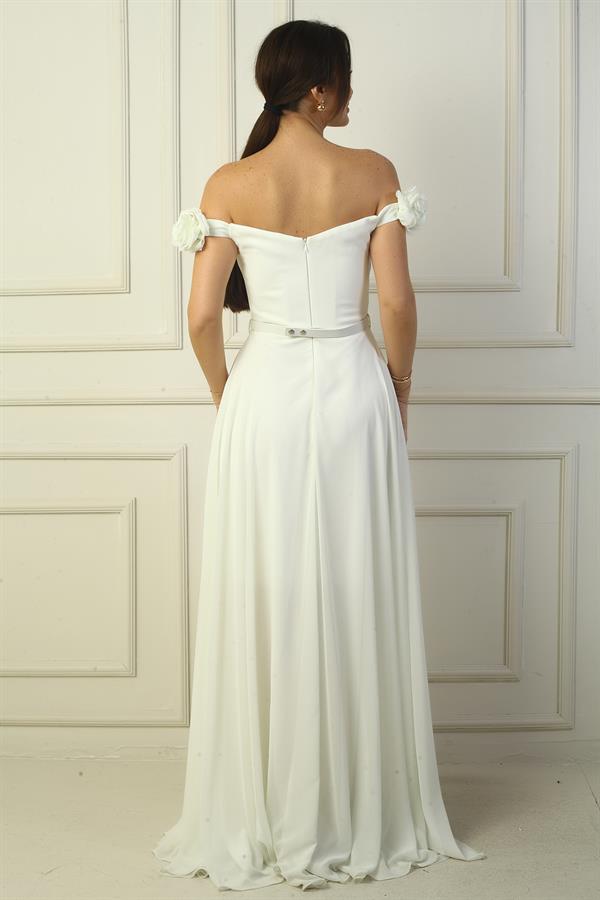 Robe longue en mousseline pour femme, ornée d'un décolleté floral découpé au laser, doublée et ceinturée à la taille.