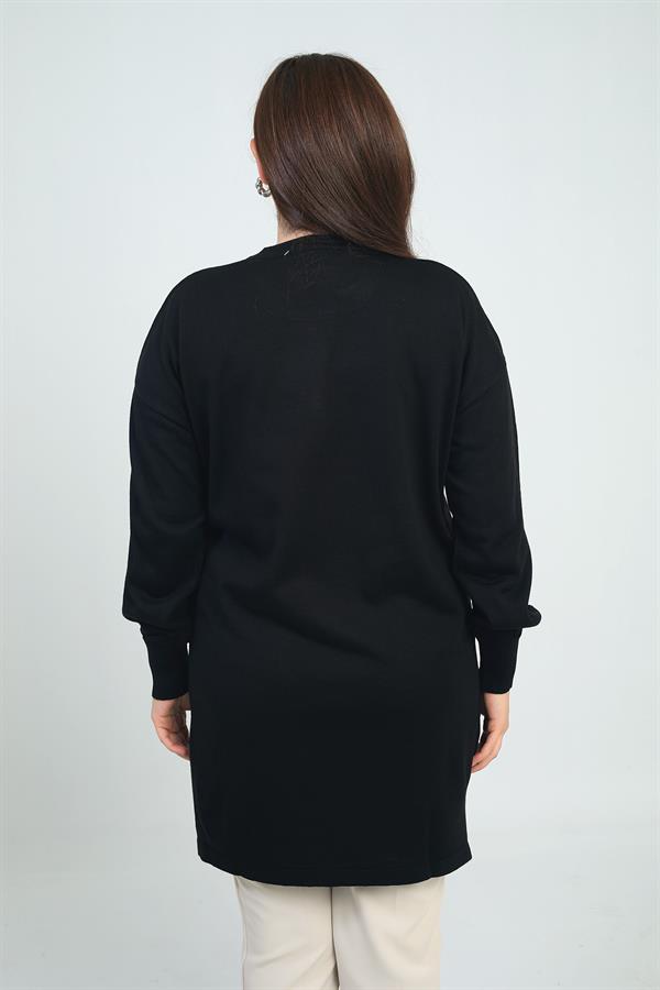 Tunique en maille grande taille pour femme, avec une poche avant et un imprimé pierre.