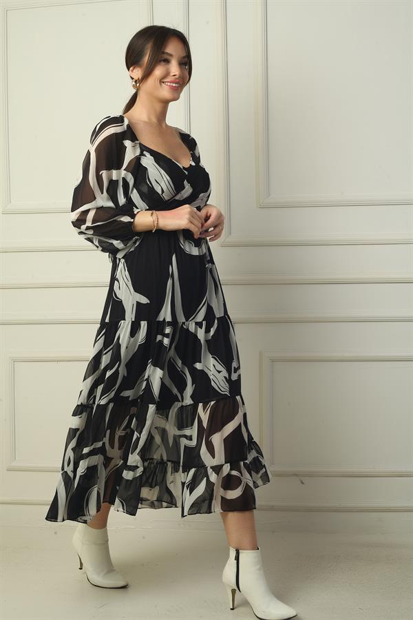 Robe portefeuille en mousseline à encolure Madonna, doublée, à nœuds croisés et motif abstrait