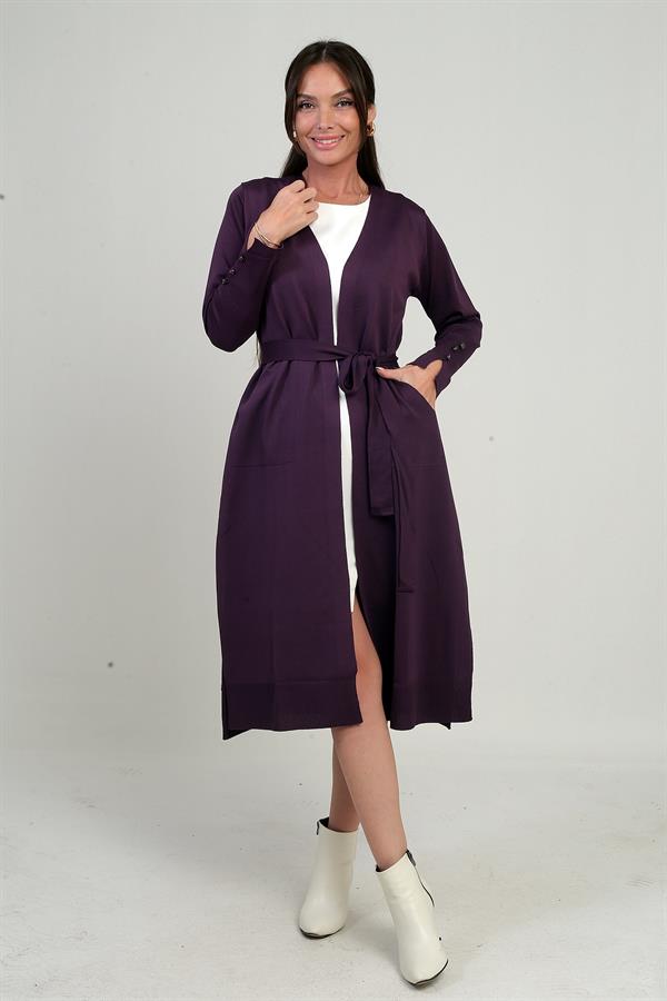 Gilet long pour femme avec manches boutonnées, poches et fentes latérales