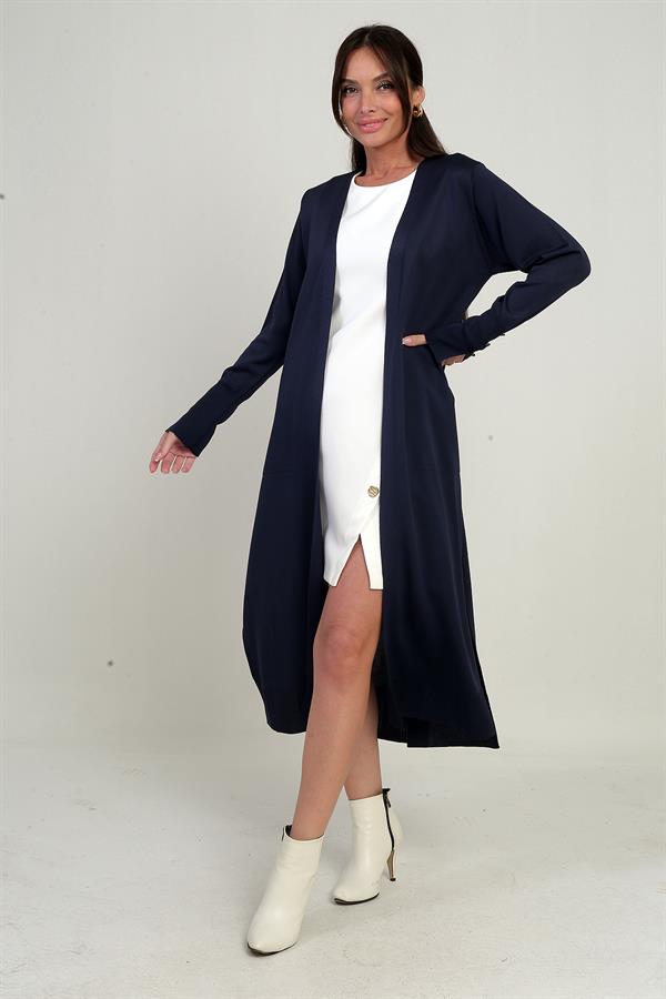 Gilet long pour femme avec manches boutonnées, poches et fentes latérales