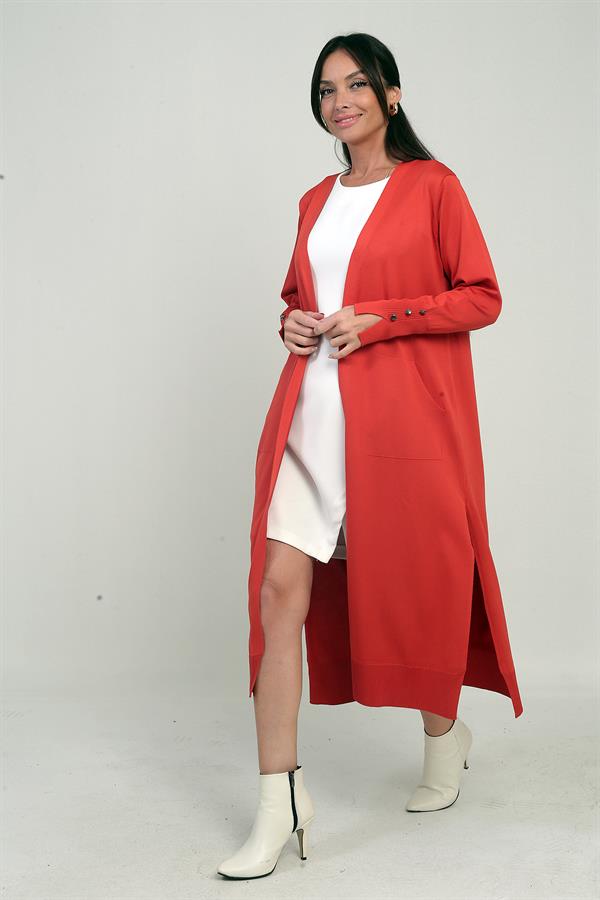 Gilet long pour femme avec manches boutonnées, poches et fentes latérales