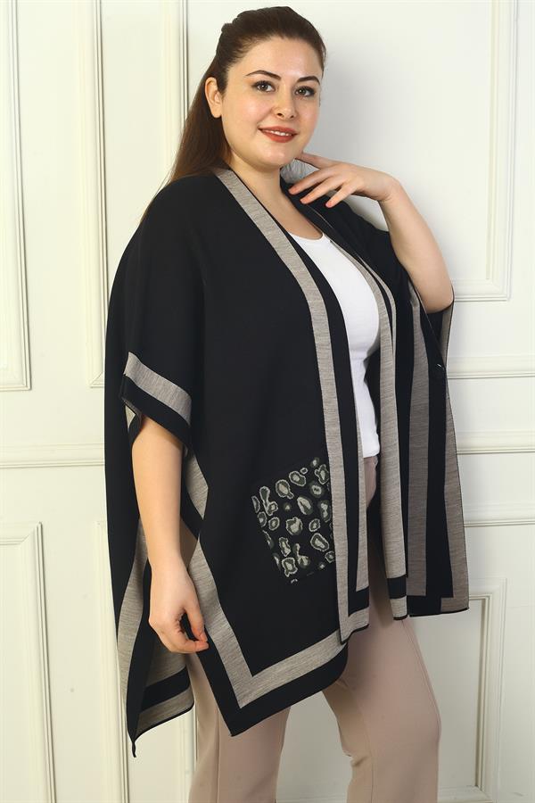 Poncho grande taille pour femme avec bouton latéral, poches rayées et imprimé léopard.