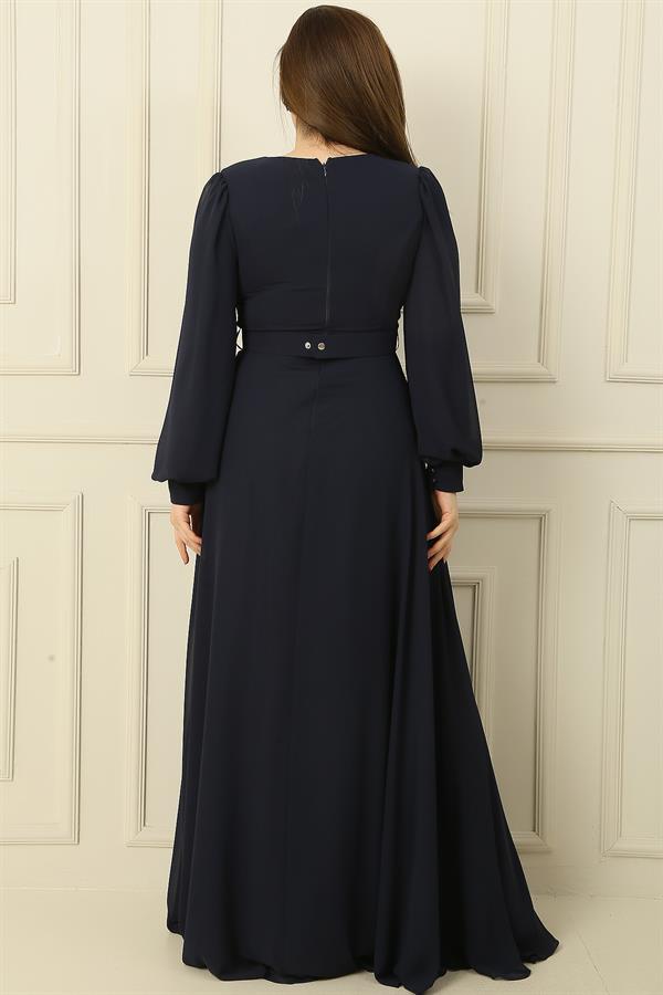 Wrap-neck, belted, lined, plus-size long modest dress.