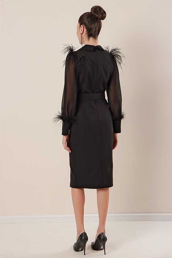 Wrap-neck, belted waist, front slit, chiffon sleeves with cuffs and feather detail, crepe dress.