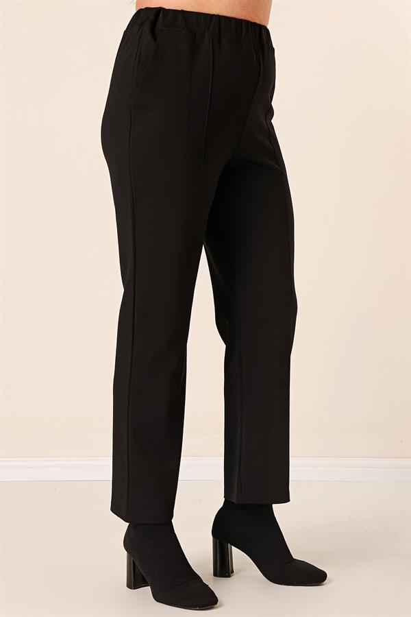 Pantalon grande taille avec taille élastique, poches latérales et tissu Lycra
