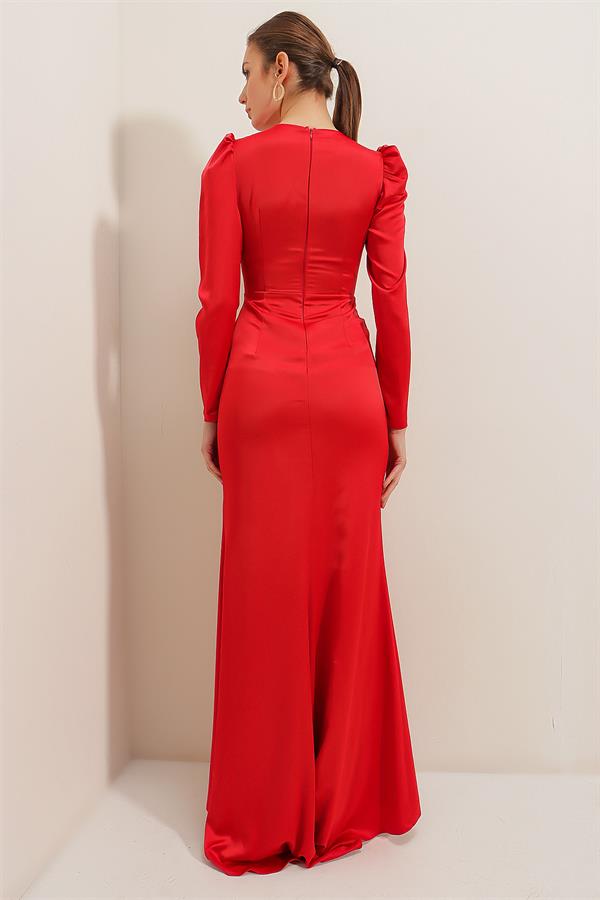 Long-sleeved satin dress with pleat detail at the front and lining.