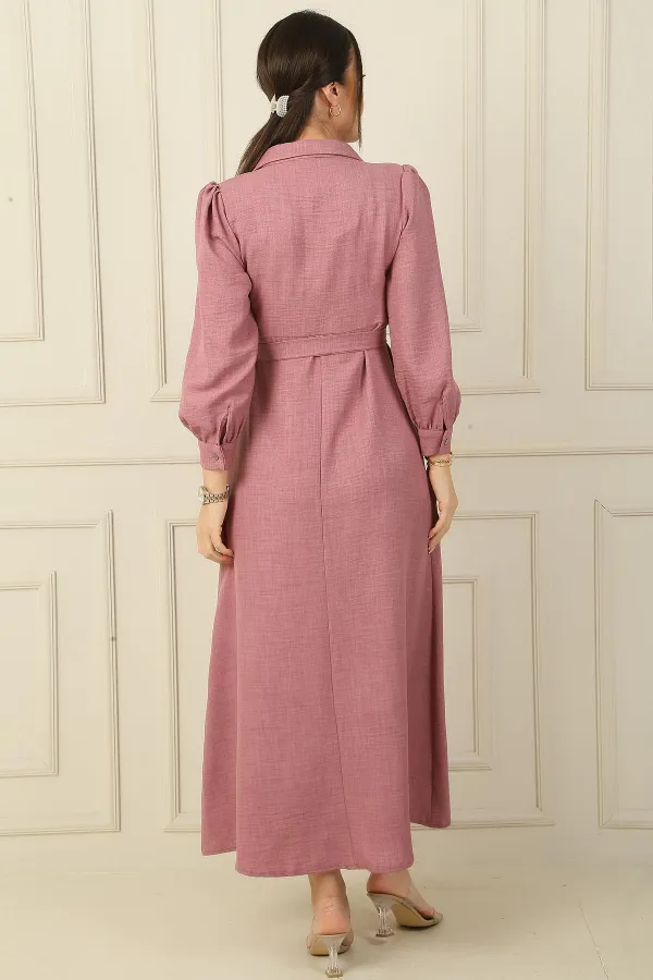 Long dress with half-button front, ribbed detail, and belted waist.