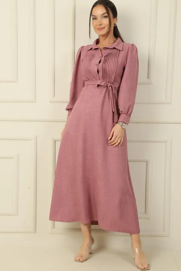 Long dress with half-button front, ribbed detail, and belted waist.