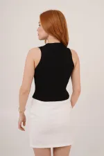 Chemisier noir en gros avec détails sans boutons de manchette