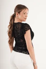 Blouse noire brodée en daim transparent à col V, disponible en gros