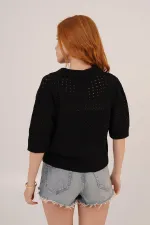 Chemisier noir ajouré à col polo en gros