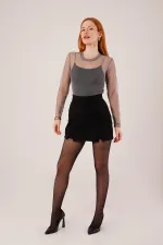 Mini-jupe noire en gros avec détail fendu