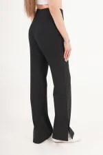 Pantalon noir à jambes évasées et fentes, vente en gros