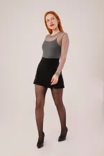 Mini-jupe noire en gros avec détail fendu