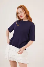 Chemisier en maille fine bleu marine à manches mi-longues et col rond en lycra