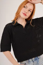 Chemisier noir ajouré à col polo en gros