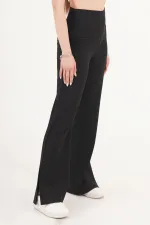 Pantalon noir à jambes évasées et fentes, vente en gros