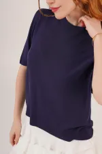 Chemisier en maille fine bleu marine à manches mi-longues et col rond en lycra