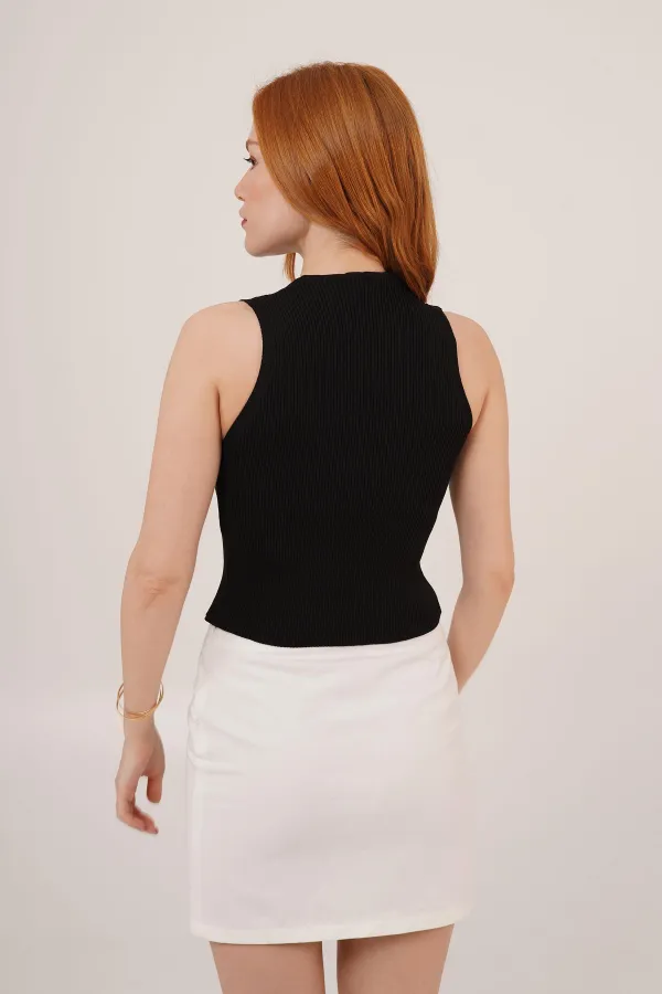 Chemisier noir en gros avec détails sans boutons de manchette