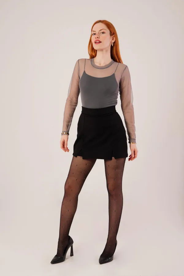 Mini-jupe noire en gros avec détail fendu
