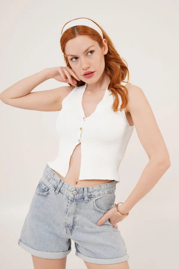 Chemisier blanc en gros avec détails sans boutons de manchette