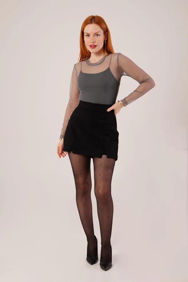 Mini-jupe noire en gros avec détail fendu