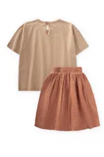 Ensemble jupe et jupe en mousseline beige à imprimé oiseaux et détails en pierre, pour enfants de 2 à 8 ans.