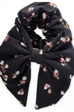 Pince à cheveux avec ruban et élastique, motif floral bleu marine.