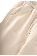 Loose-fitting girls' trousers, ages 2-12, beige. Loose-fitting girls' trousers, ages 2-12, beige.