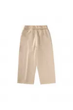 Loose-fitting girls' trousers, ages 2-12, beige. Loose-fitting girls' trousers, ages 2-12, beige.