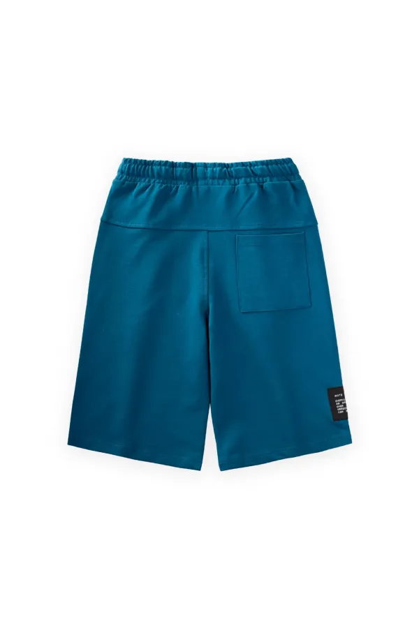 Capri de poche 8-12 ans Bleu pétrole