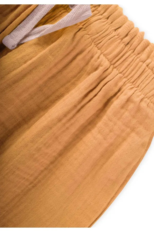 Organic Beli Fırfırlı Geniş Kesim Müslin Pantolon 1-8 Yaş Sundres Organic Beli Fırfırlı Geniş Kesim Müslin Pantolon 1-8 Yaş Sundres