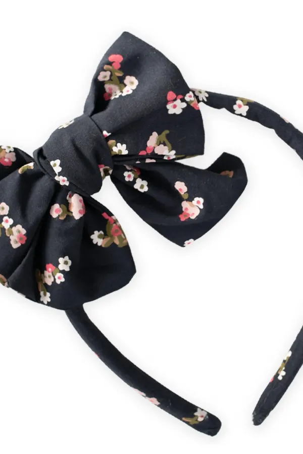 Grand nœud couronné de fleur noire