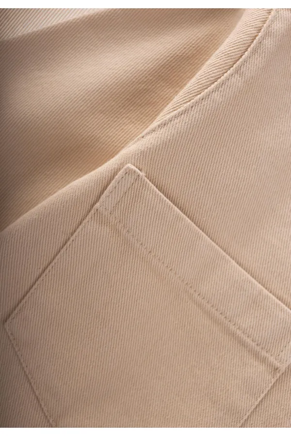 Veste en gabardine beige à grandes poches doubles, pour les enfants de 2 à 7 ans.