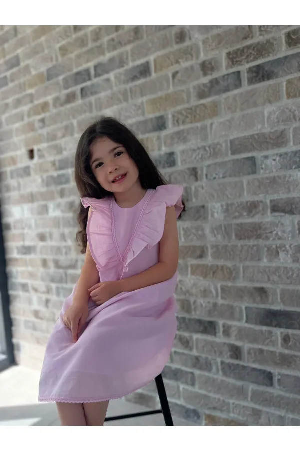 Robe rose avec ourlet et dos en dentelle pour les enfants de 2 à 7 ans