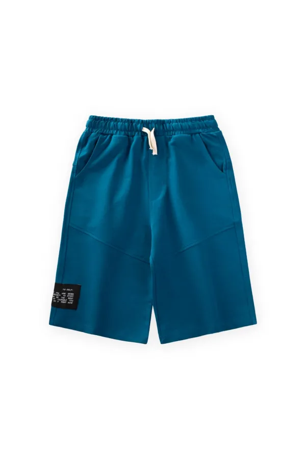 Capri de poche 8-12 ans Bleu pétrole