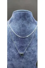 Collier argenté à double chaîne en forme de cœur