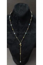 Minimalist Necklace with Dolphin Figurine and Evil Eye Bead Detail