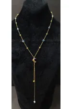 Minimalist Necklace with Dolphin Figurine and Evil Eye Bead Detail