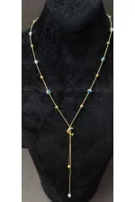 Minimalist Necklace with Dolphin Figurine and Evil Eye Bead Detail